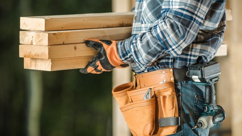 contractor holding wood