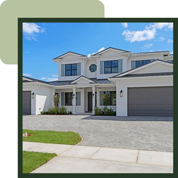 Outside of a home with a large driveway