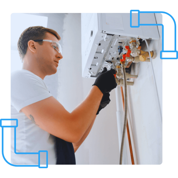 technician fixing a broiler