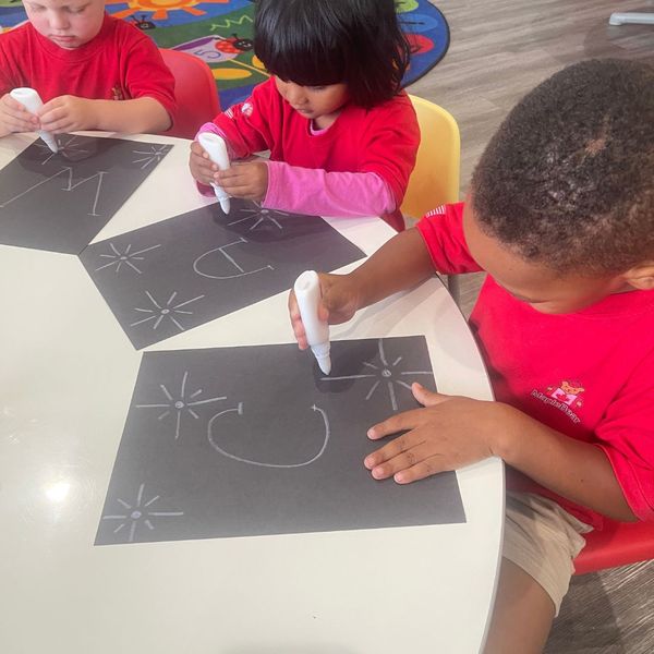 kids drawing and practicing their letters Preparing for Fall2.jpg