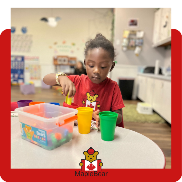 A young student playing independently Education Benefits-4.png