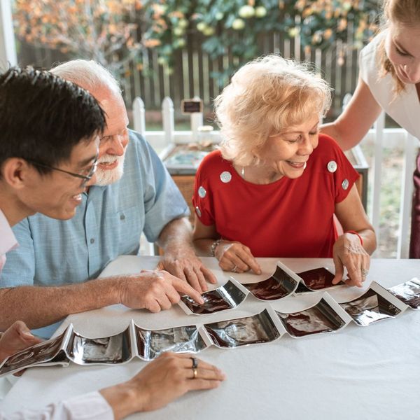 family looking at ultrasound images