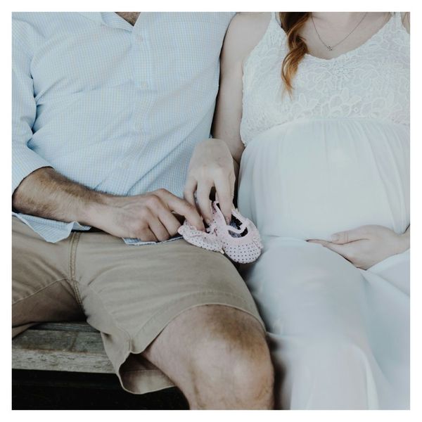 couple taking a pregnancy photo