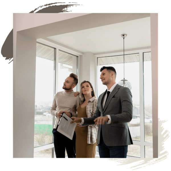 realtor showing home to a couple