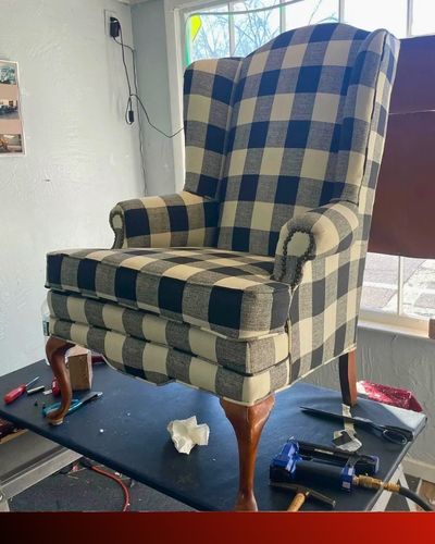 an upholstered armchair