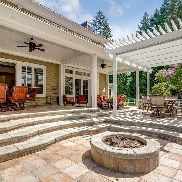 a concrete patio complete with firepit