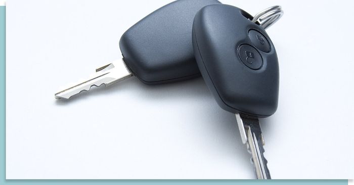 set of car keys on a white background