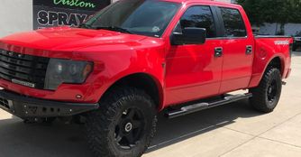 Red truck with window tint