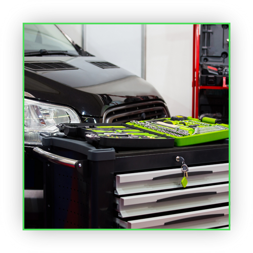 toolbox in front of a black car