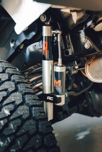 Rough Country M1 Reservoir shock absorber installed on a Jeep Wrangler rear suspension.