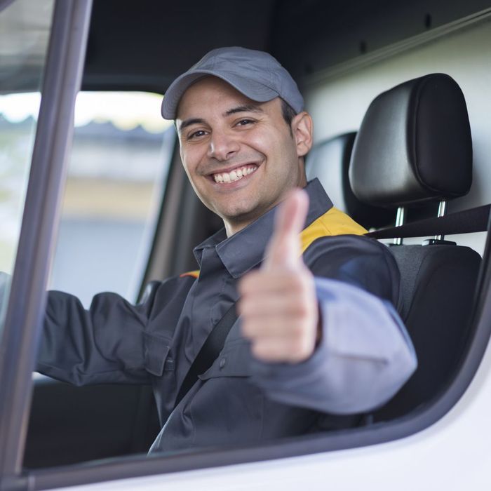 a van driver giving a thumbs up