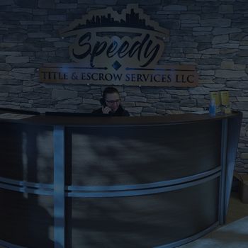 Receptionist in lobby of Speedy Title & Escrow Services