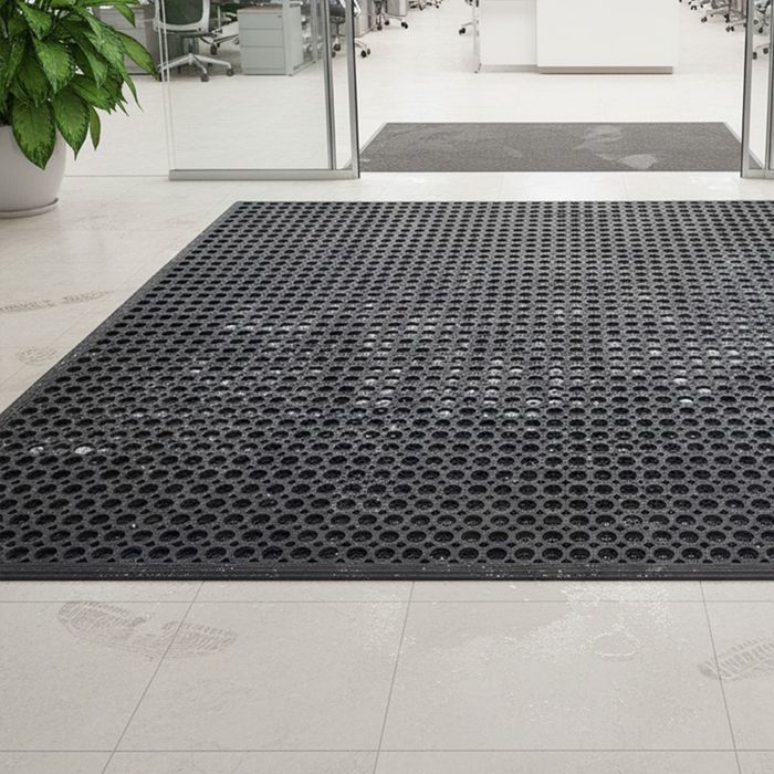 a floor mat placed in a commercial building entrance flooring.jpg