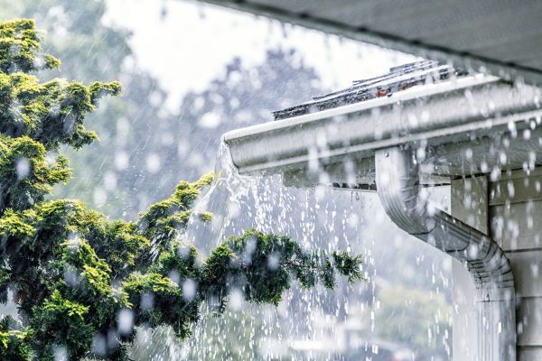 Water pouring into a gutter