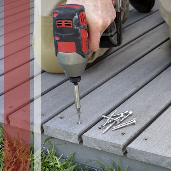 drilling screws into a deck