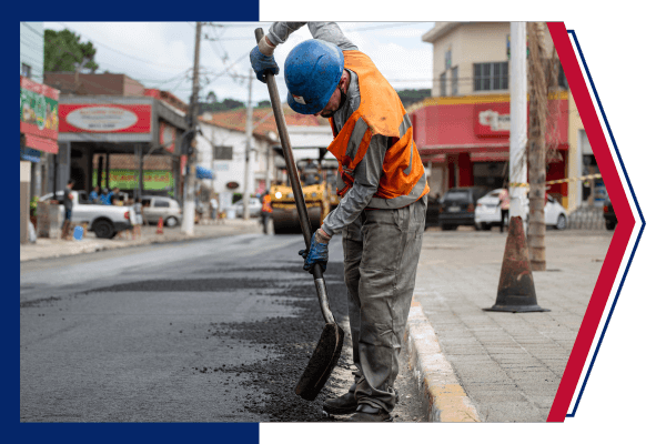 man paving road