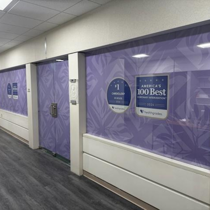 purple windows decorated with office awards