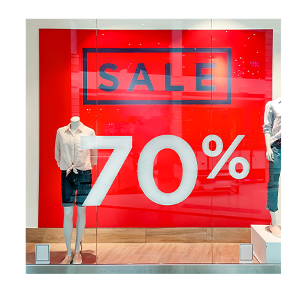 retail store signage "Sale" and 70% window cling