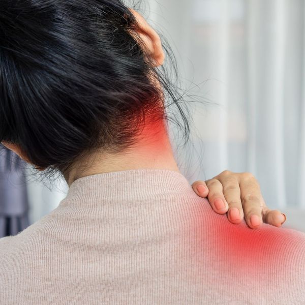 woman with neck and back pain