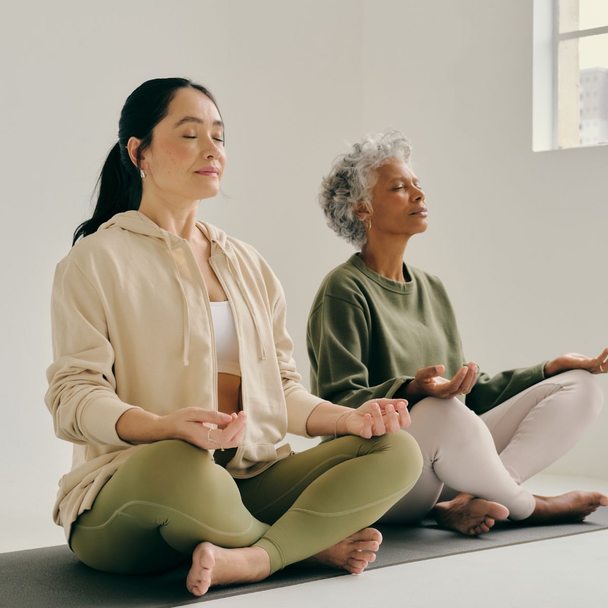 two women meditating