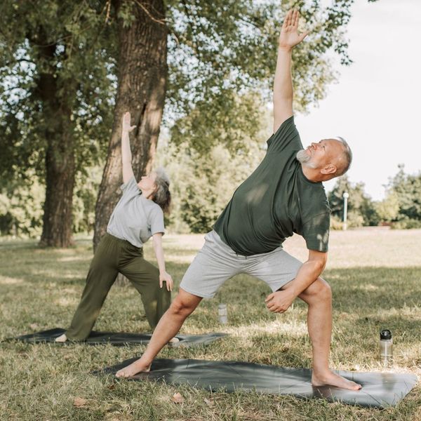 couple doing yoga 