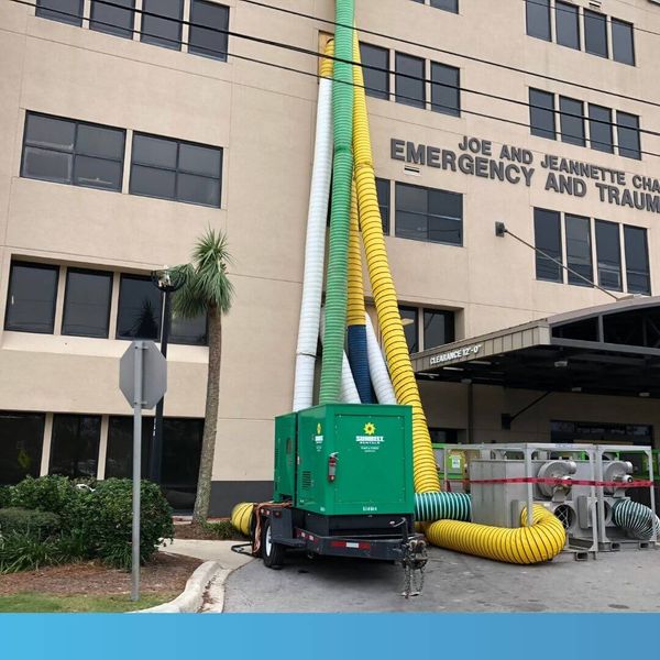 portable dehumidifier attached to building