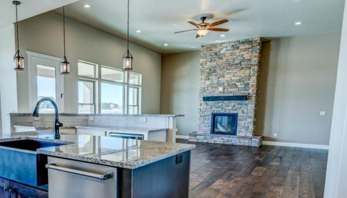 Interior home with stone masonry fireplace