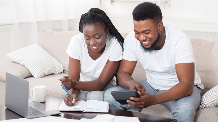 couple sits down to make a budget