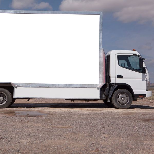 Billboard truck with a blank white billboard. 