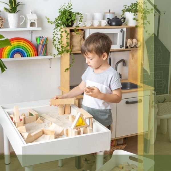 Preschool Child Playing with Blocks