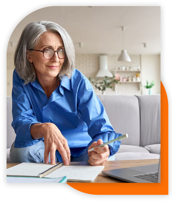 img of a woman looking at the computer