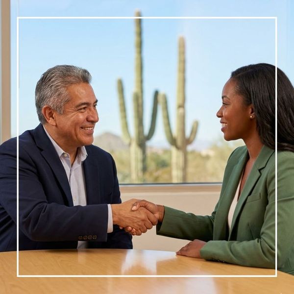Warm Arizona handshake, diverse partners