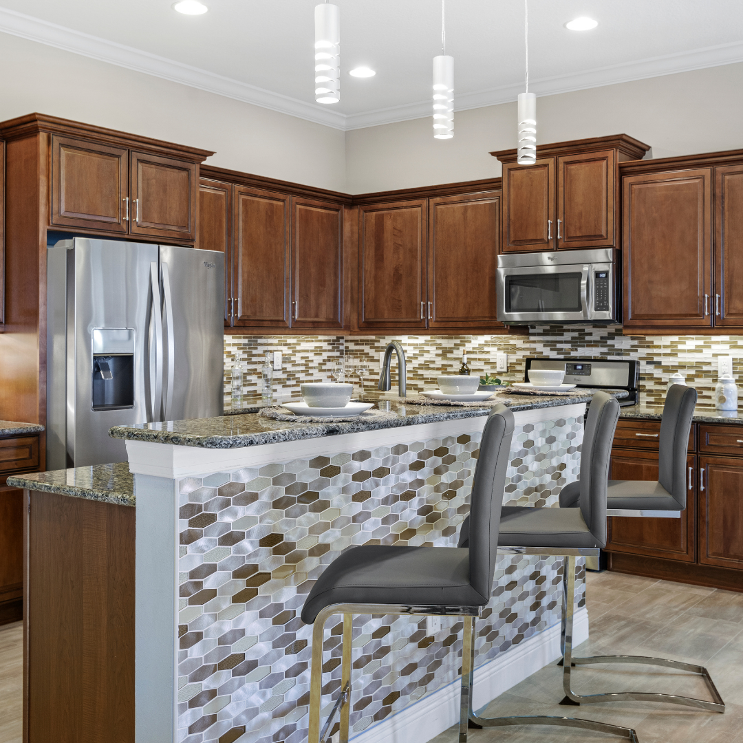 kitchen with tile detailing on island 