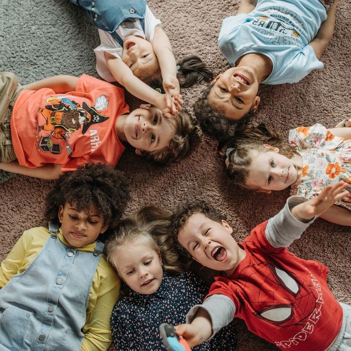 kids laying on the carpet