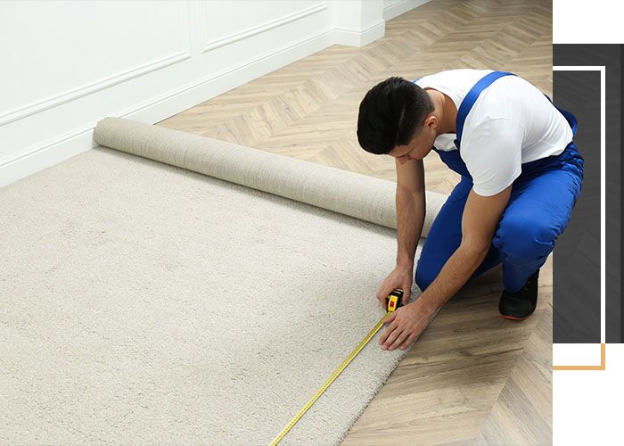 technician installing carpet