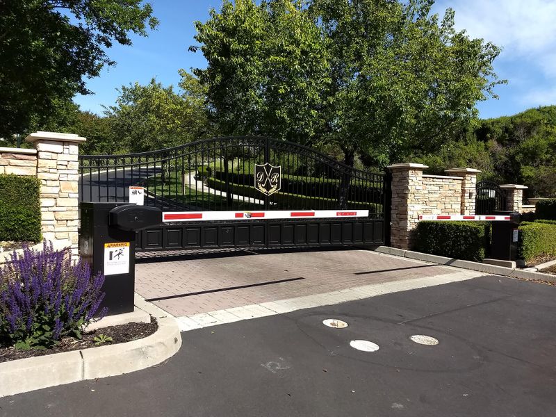 Bi-Parting Swing Gate Interfaced with Barrier Gate at Dublin Ranch in Dublin, CA