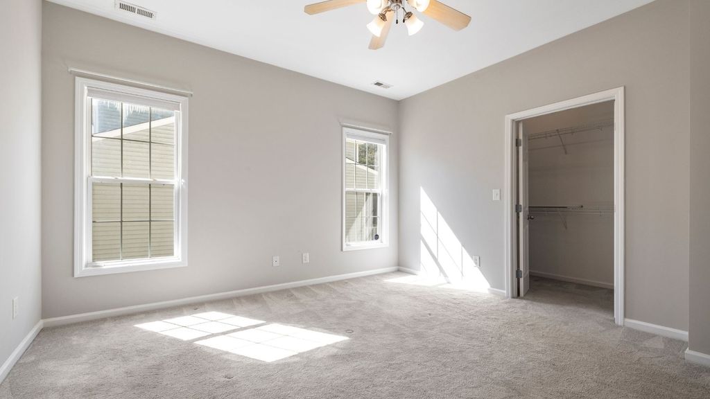 well-lit room with freshly cleaned carpet