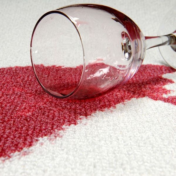 spilled glass of red wine