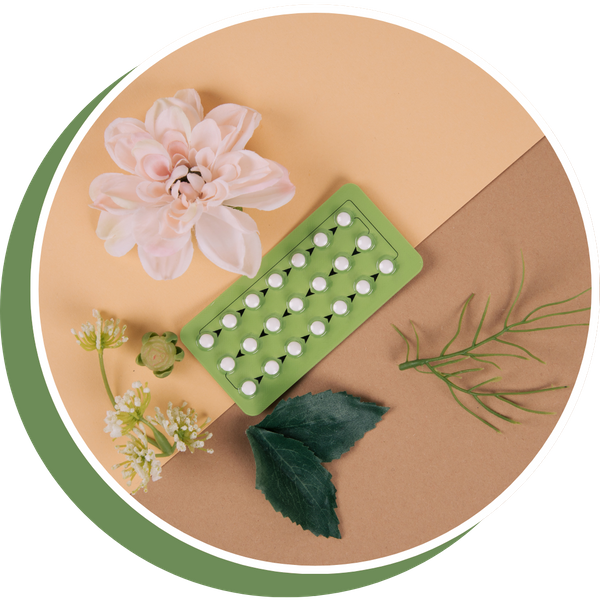 birth control package resting next to flowers