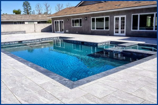 pool with pavers around it