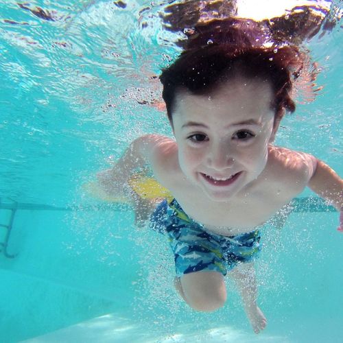 Smiling child in pool