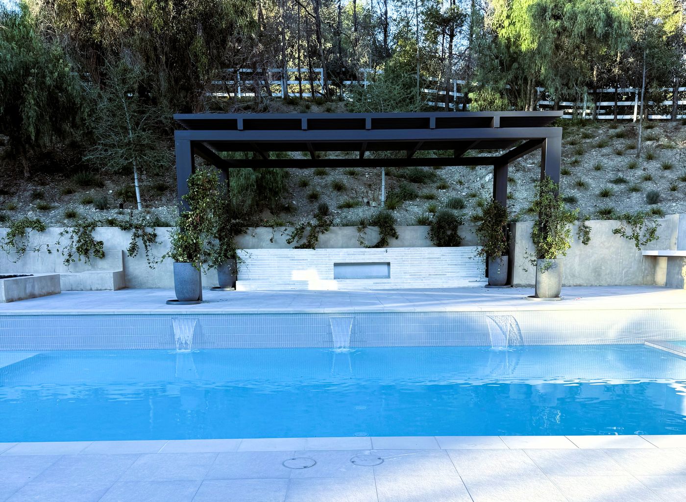 Raised Wall Pool with Pergola in Hidden Hills