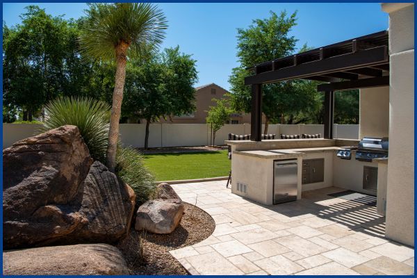 pavers for back patio with outdoor kitchen