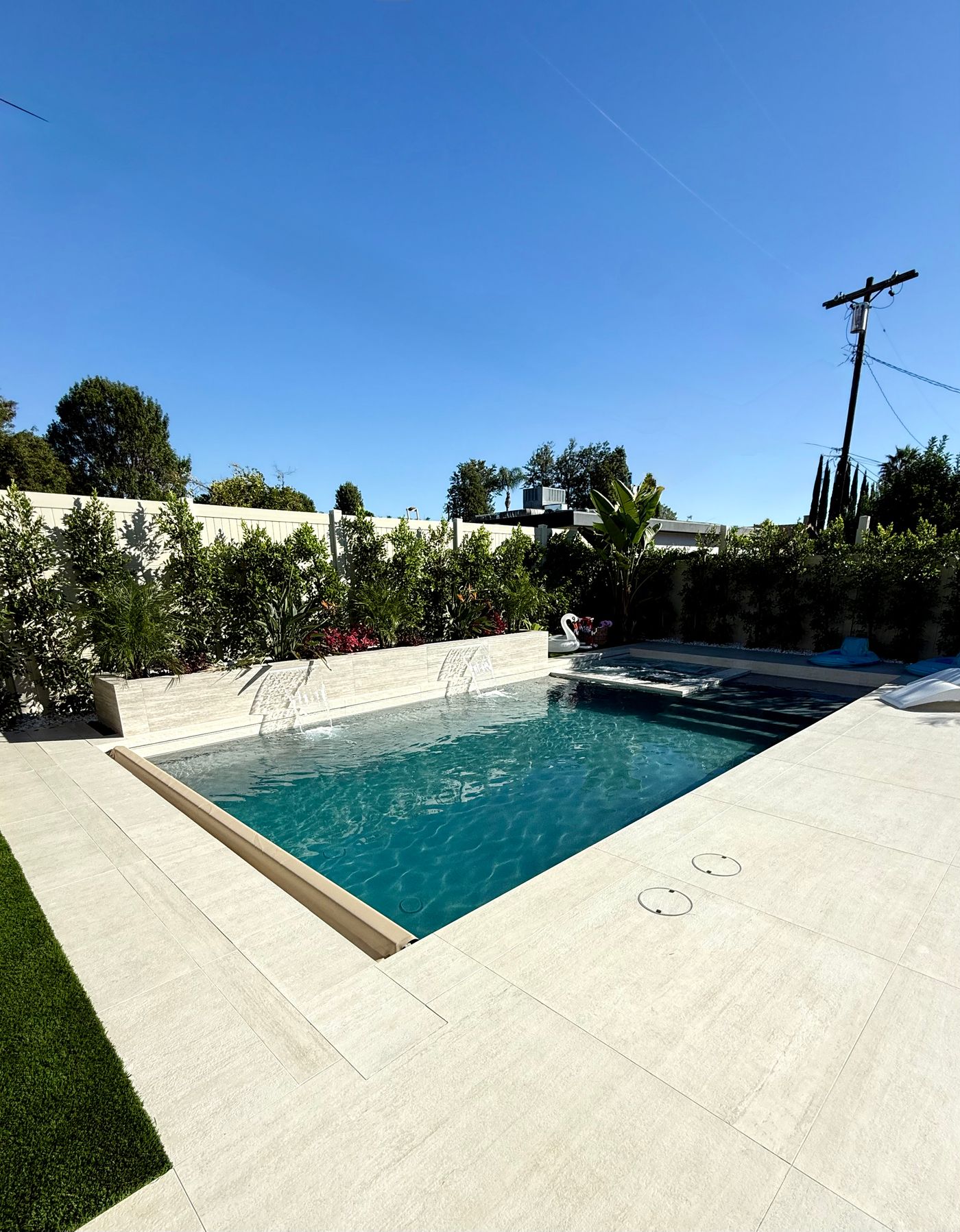 Woodland Hills pool and spa, Modern pool design, Water feature pool, Baja shelf swimming pool, Luxury outdoor living