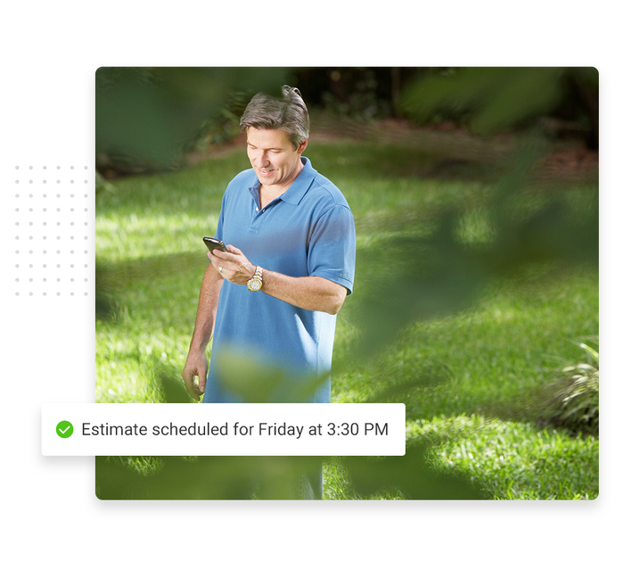 Man standing in yard looking at phone overlaid with a checkmark that says 'Estimate scheduled for Friday at 3:30 PM' tree care scheduling software
