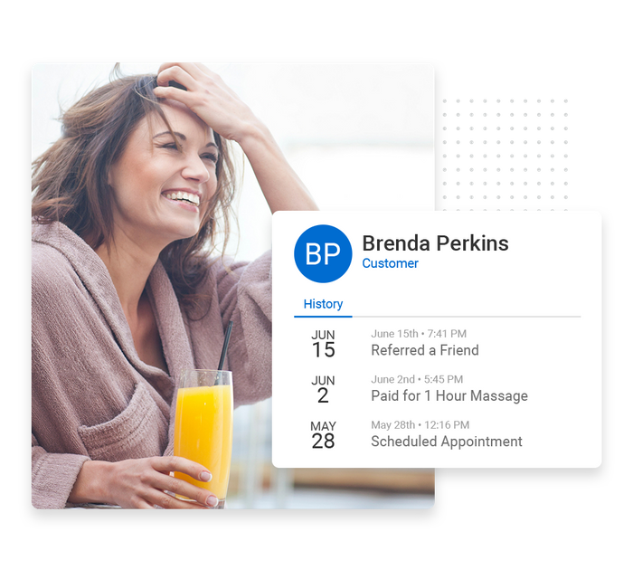 Smiling woman with a glass of orange juice overlaid with client history details from the Marketing 360® CRM spa CRM