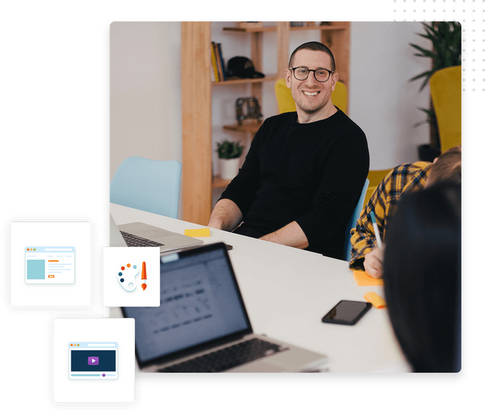 Man smiles across a shared workspace at his team overlaid with marketing platform icons Marketing platform for small business
