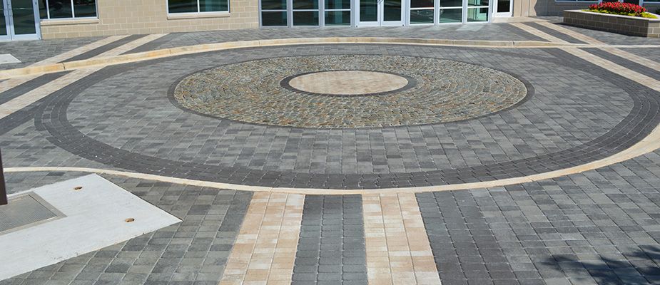 decorative paved entry driveway to a business