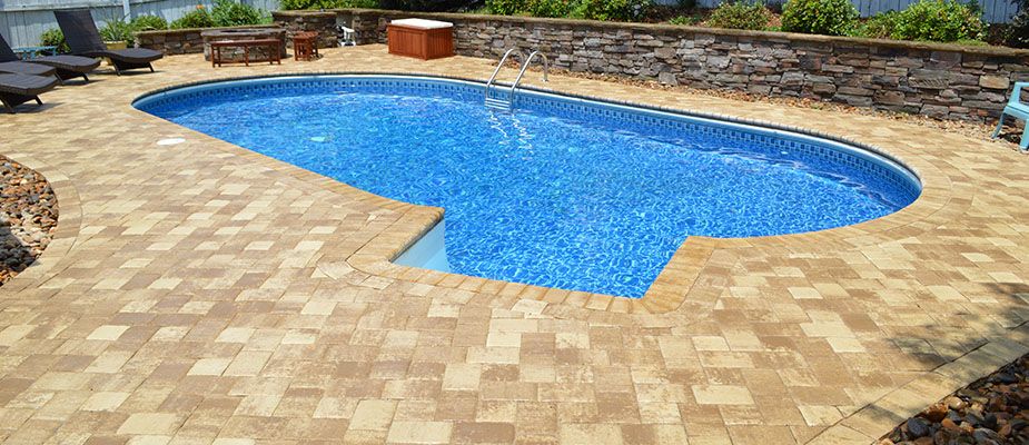 pool deck with paved bricks