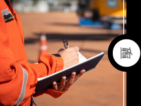 man holding clipboard by truck